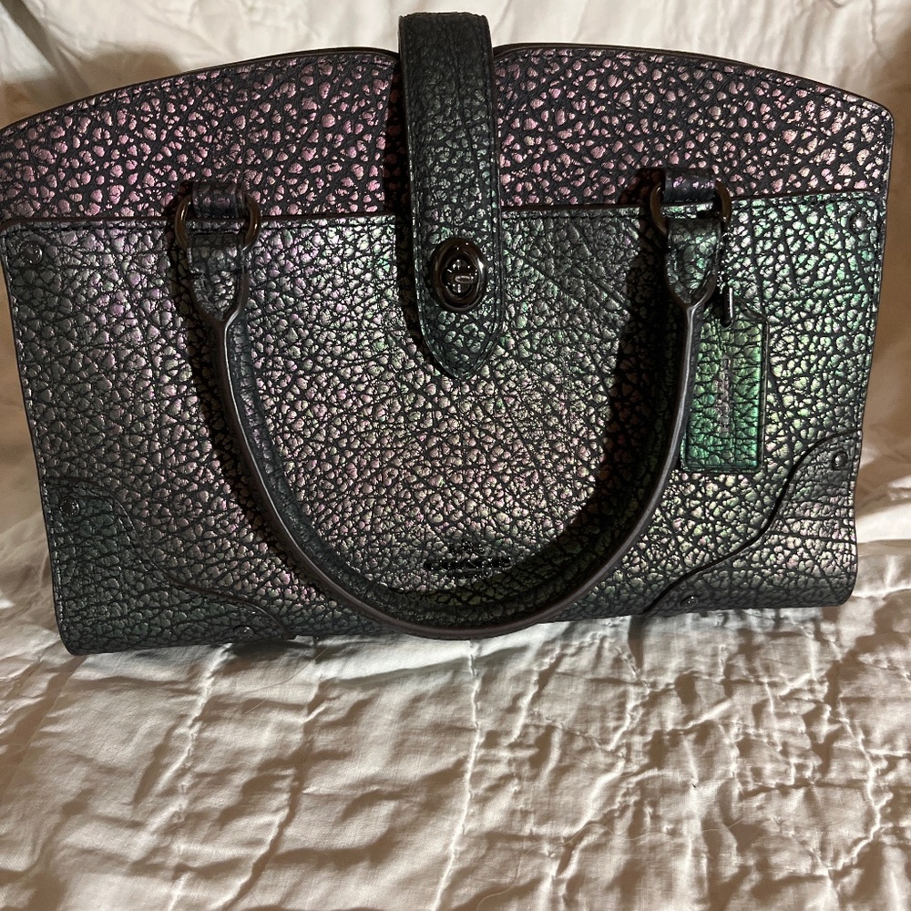 More pics of the iridescent Mercer 24 with shoulder strap